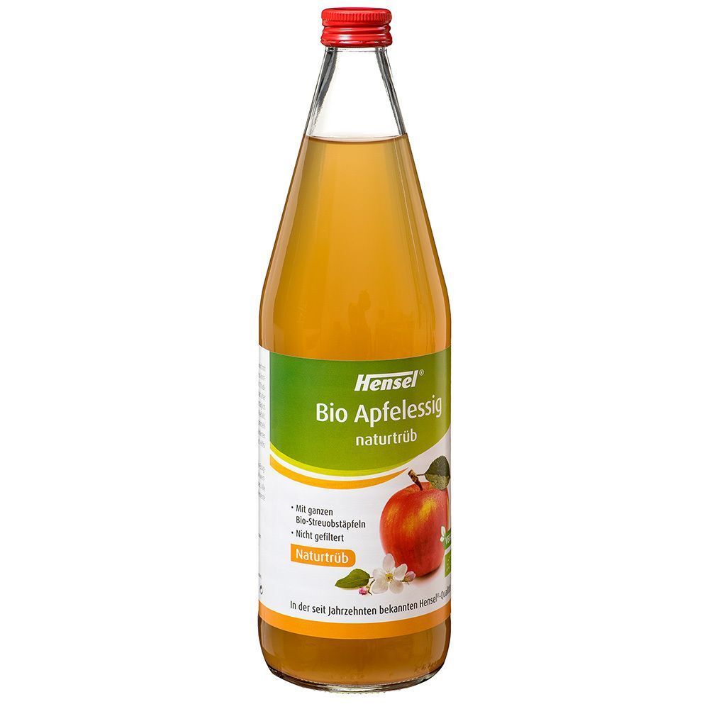 Eine Flasche Bio-Apfelessig von Hensel. Grünes Etikett mit Apfel-Illustration. Roter Verschluss.