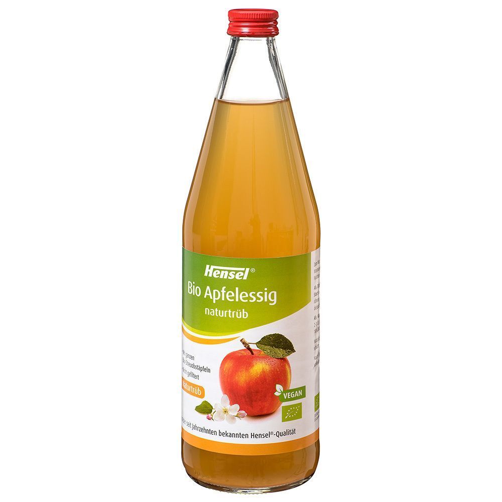 Eine Flasche Bio-Apfelessig von Hensel. Grünes Etikett mit Apfel-Illustration. Roter Verschluss.