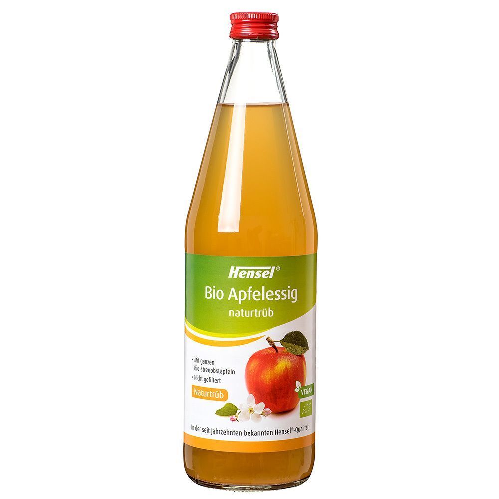 Eine Flasche Bio-Apfelessig von Hensel. Grünes Etikett mit Apfel-Illustration. Roter Verschluss.