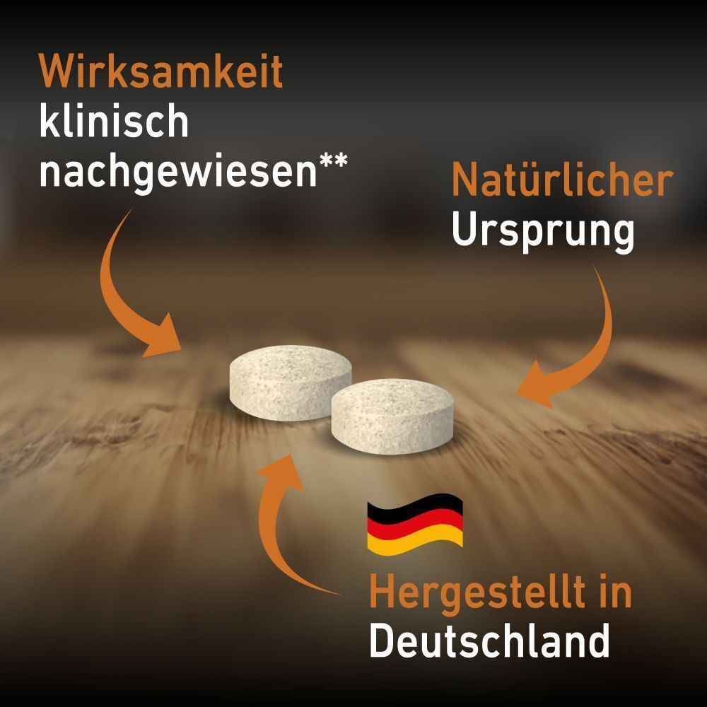 Zwei Tabletten auf Holzgrund. Text: Wirksamkeit klinisch nachgewiesen. Natürlicher Ursprung. Hergestellt in Deutschland.
