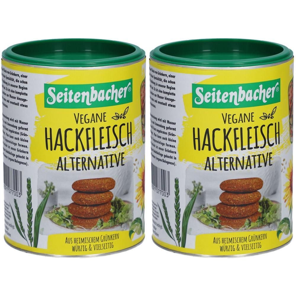 Zwei Dosen mit grünem Deckel. Auf gelbem Hintergrund steht "Seitenbacher Vegane Hackfleisch Alternative". Abbildung von Hackfleisch-Ersatz.