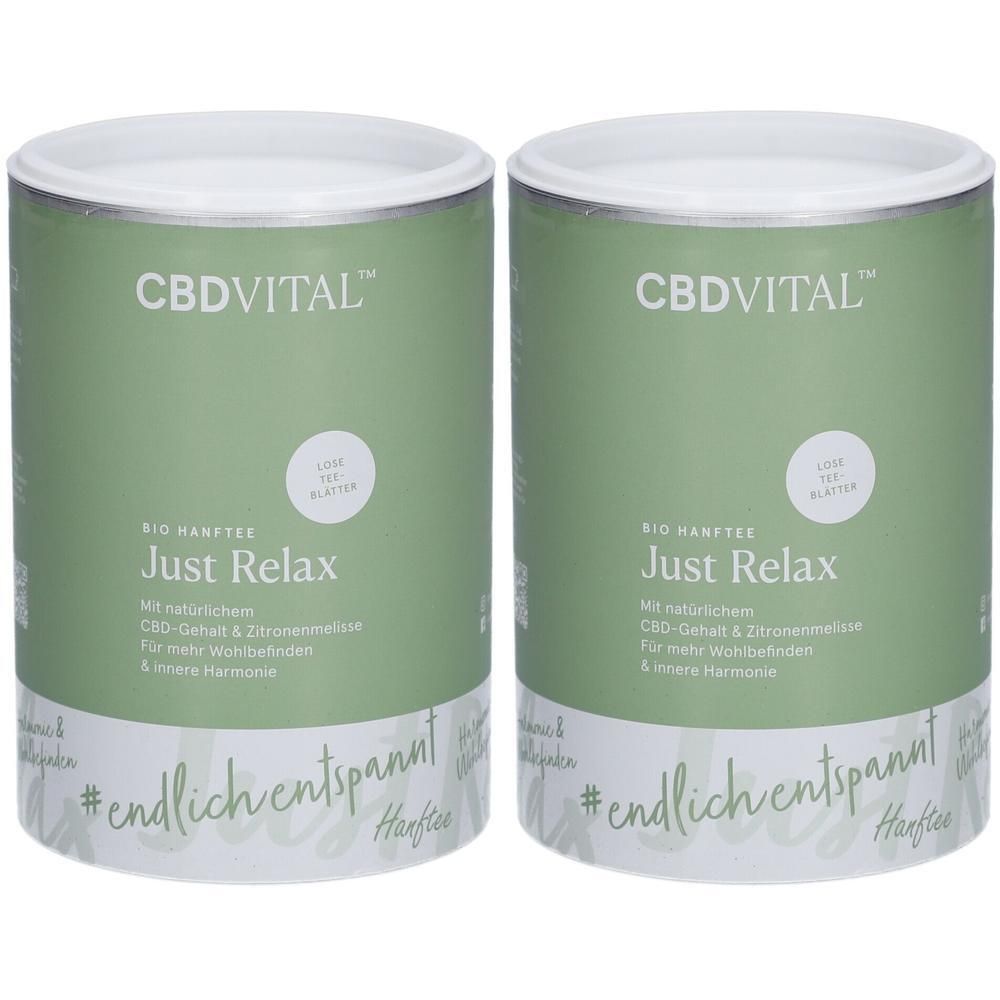 Zwei zylindrische Dosen mit weißem Deckel. Aufschrift CBDVITAL, BIO HANFTEE Just Relax. Grün-weiße Verpackung mit Text und Logo.