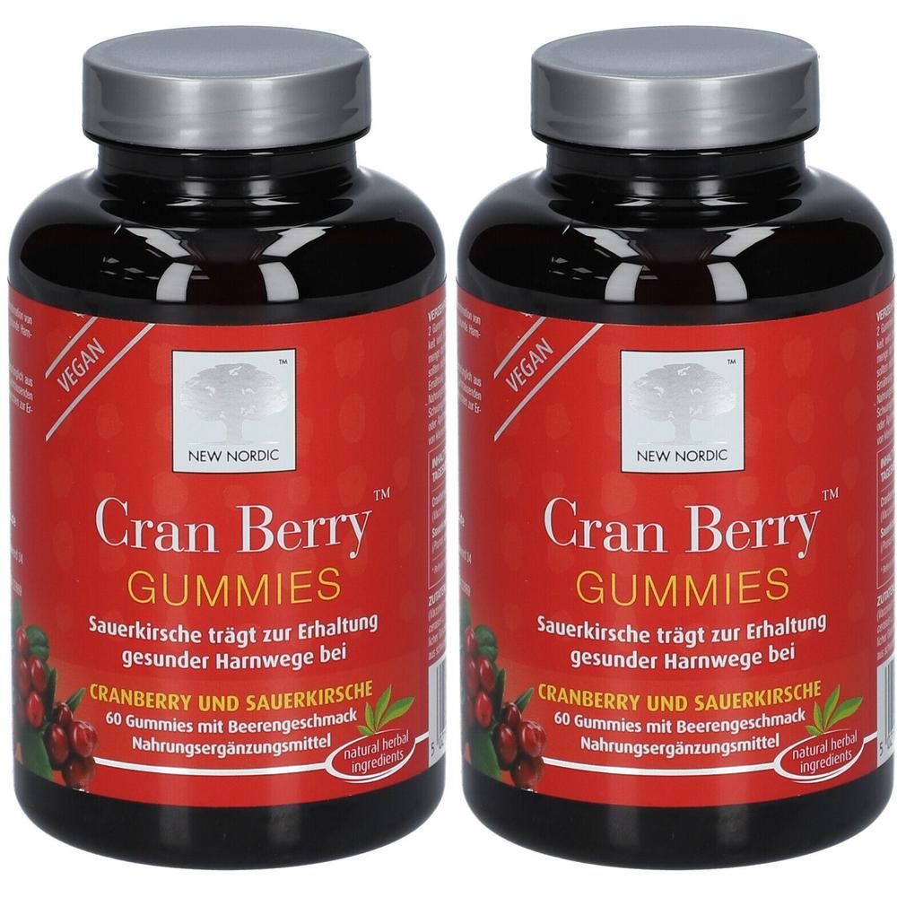 Zwei Flaschen mit Cranberry Gummies. Rote Etiketten mit Produktnamen und Logo. Schwarze Deckel und Flaschenkörper.