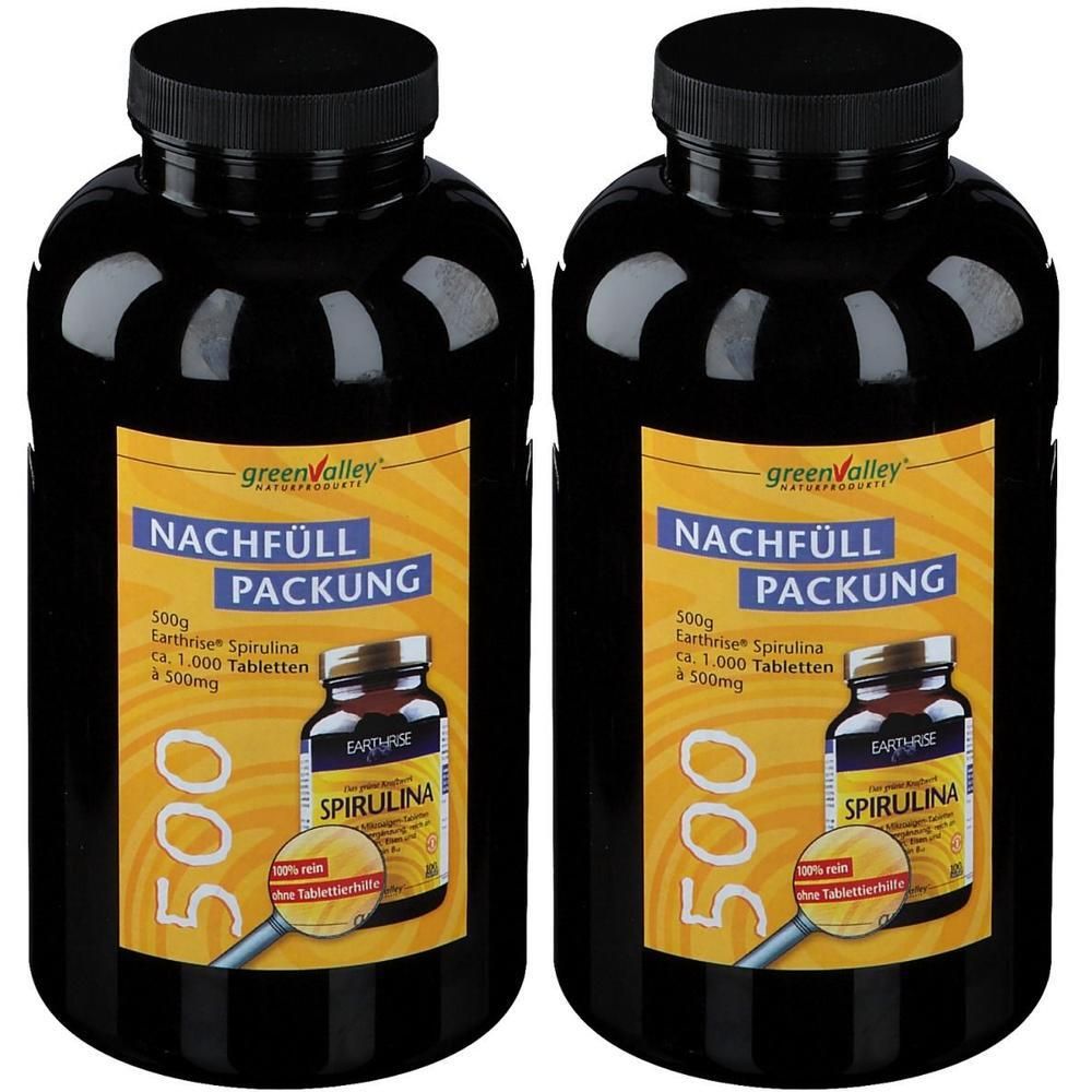 Zwei schwarze Flaschen mit schwarzen Deckeln. Aufkleber mit gelbem Hintergrund und Schriftzug 'NACHFÜLL PACKUNG'. Enthält Spirulina Tabletten.