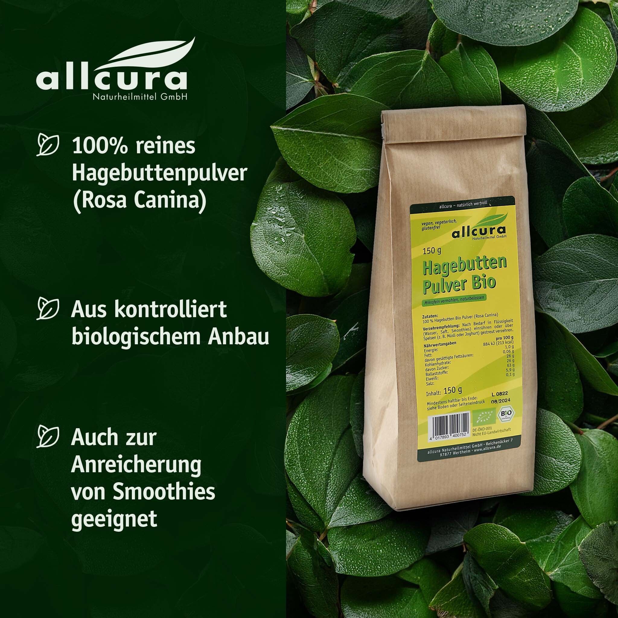 Brauner Papierbeutel mit Etikett, umgeben von grünen Blättern. Aufschrift: allcura, Hagebutten Pulver Bio, 150g. Bio-Siegel.