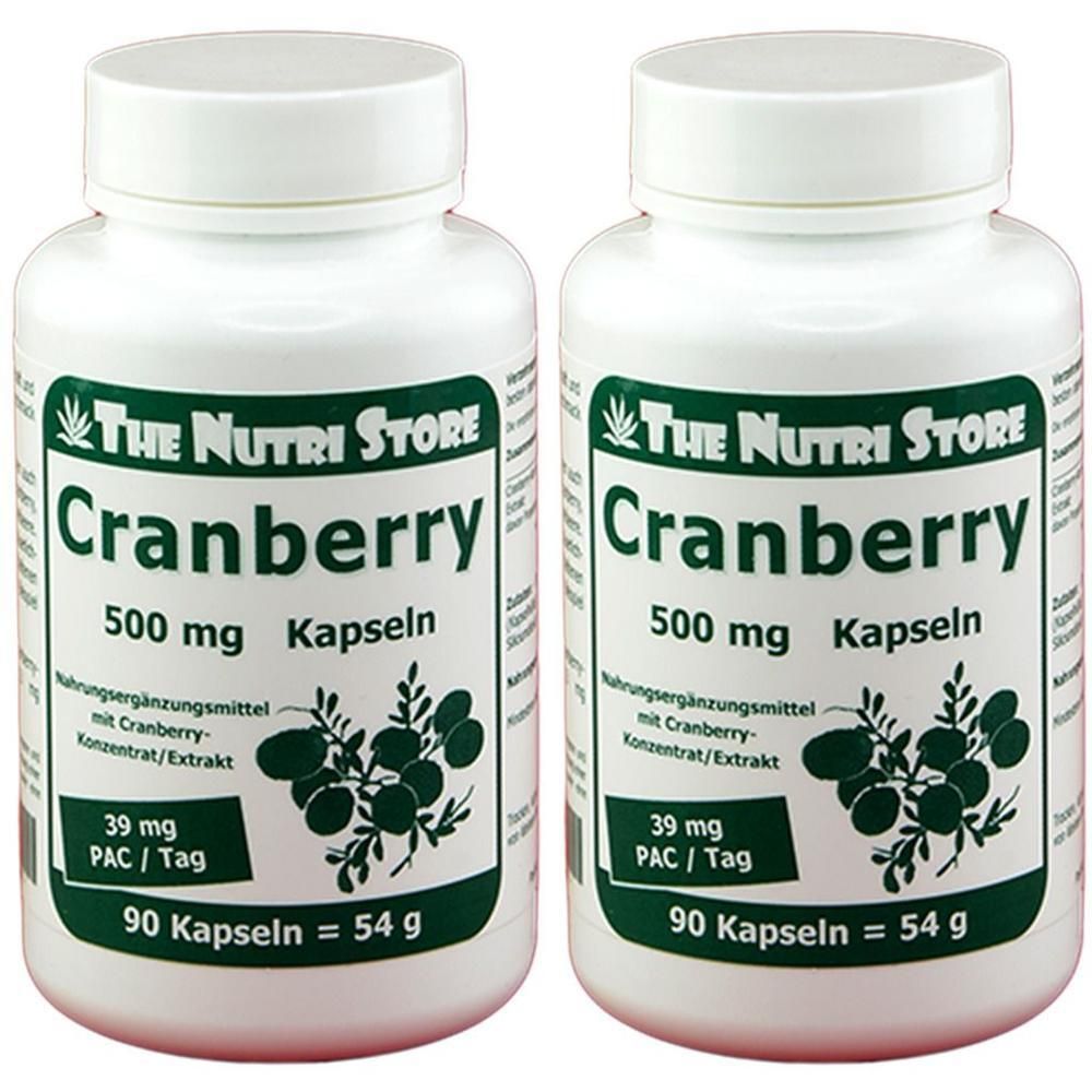Zwei weiße Flaschen mit Cranberry-Kapseln. Aufschrift: The Nutri Store, Cranberry 500 mg Kapseln, 90 Kapseln = 54 g.