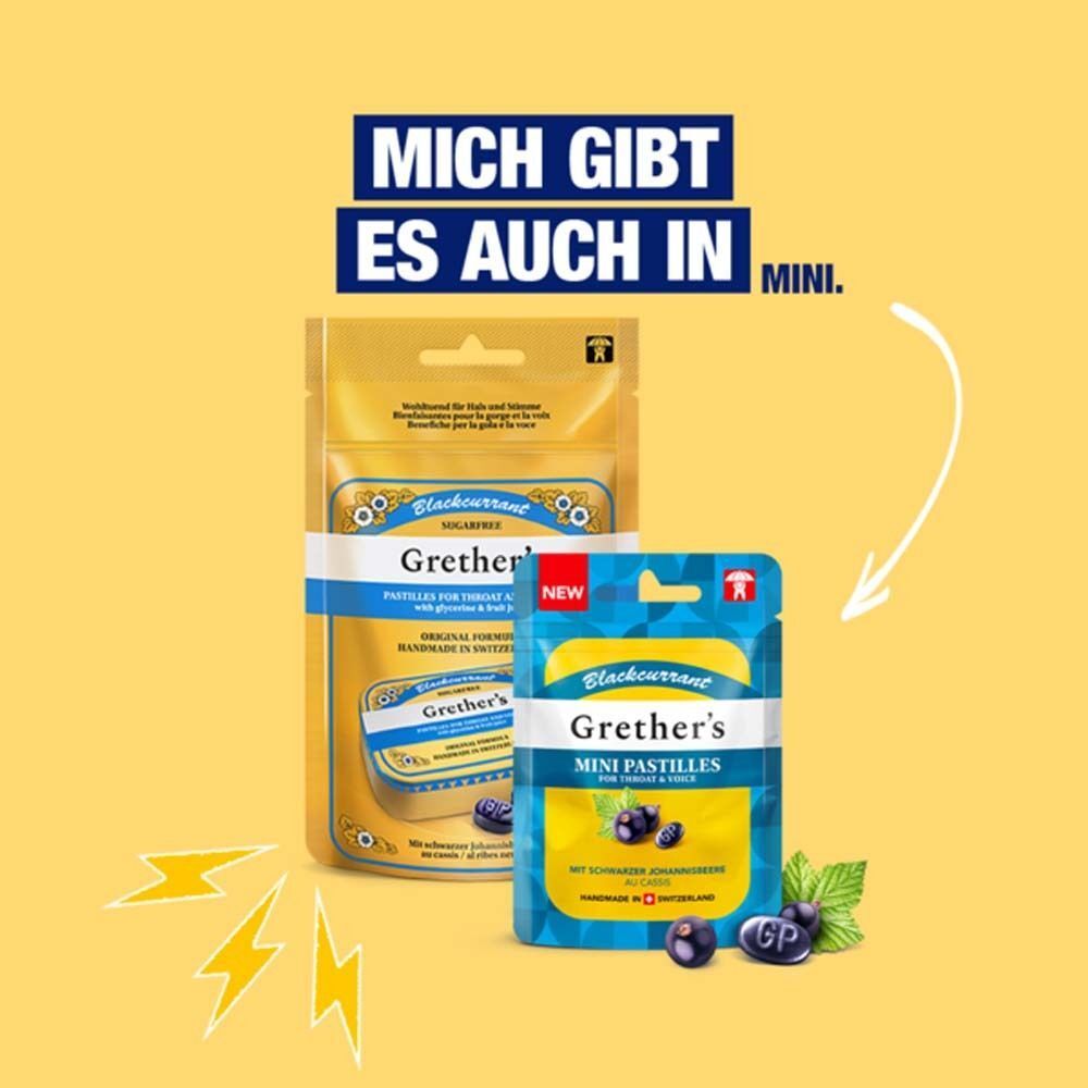 Zwei Grether's Mini Pastilles-Beutel, einer gold, einer blau. Text: "MICH GIBT ES AUCH IN MINI." und Produktnamen. Abbildung von Johannisbeeren.