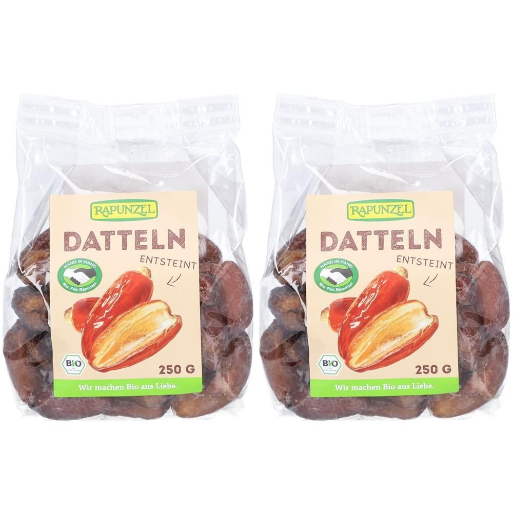 Zwei Beutel Rapunzel Datteln, entsteint. Aufdruck: Datteln, Bio-Siegel, 250g. Klare Plastikverpackung mit Etikett.