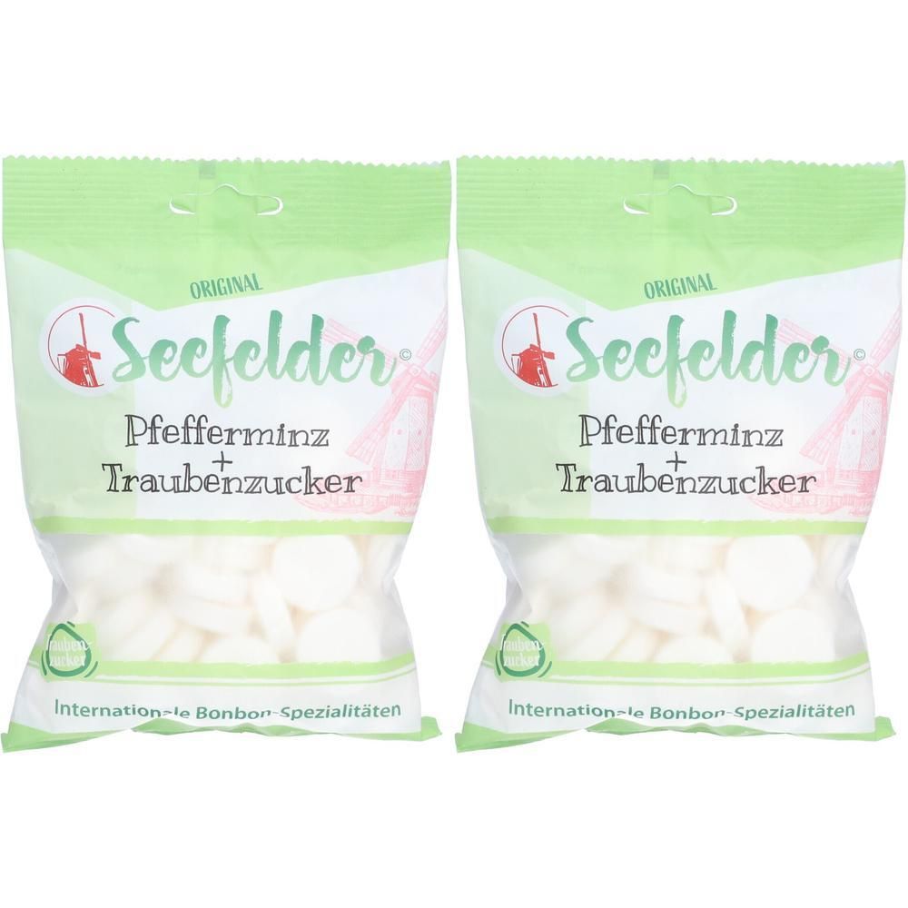 Zwei Beutel SEEFELDER Pfefferminz plus Traubenzucker. Grüne Verpackung mit weißem Inhalt. Text: Pfefferminz, Traubenzucker, Internationale Bonbon Spezialitäten.