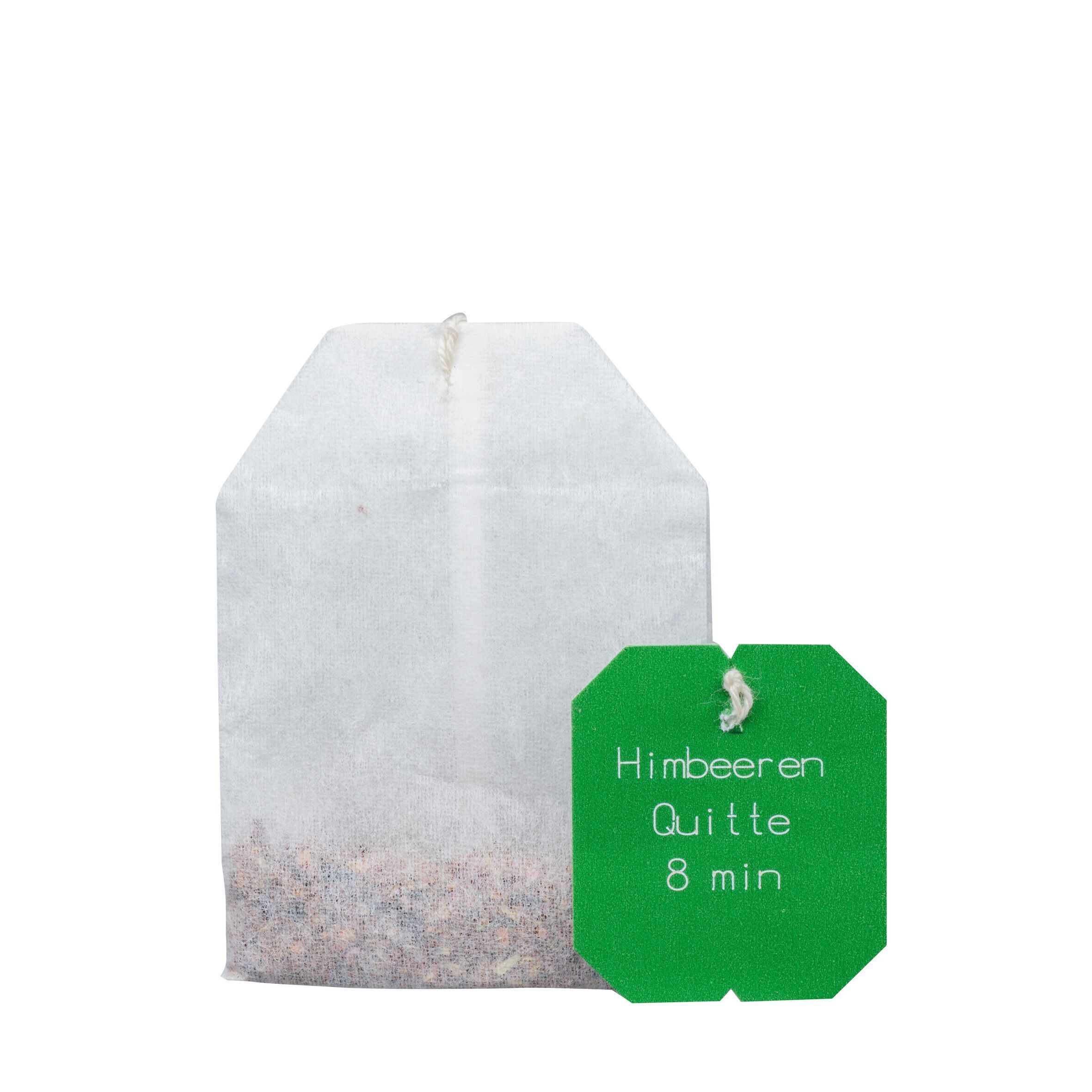 Einzelner Teebeutel mit grünem Etikett. Aufdruck: Himbeeren 8 min.