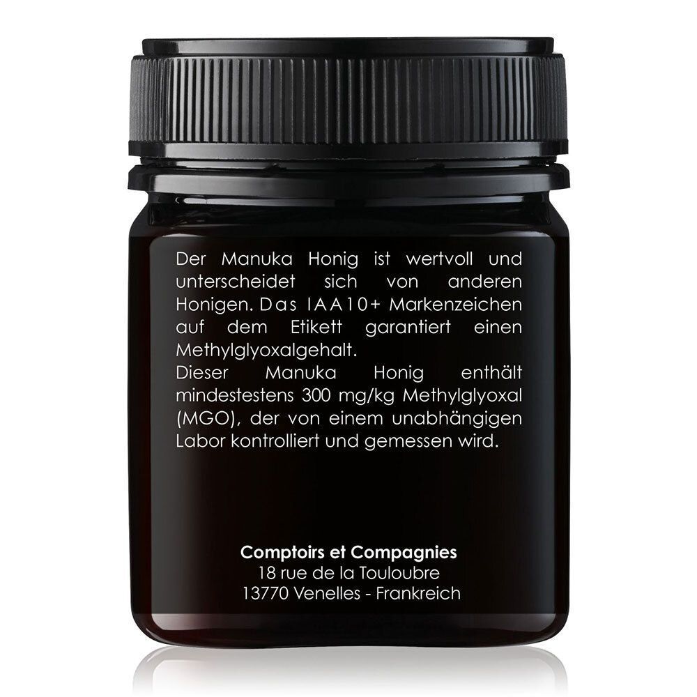 Rückseite eines Glases mit schwarzem Deckel. Text: Informationen über Manuka Honig und Methylglyoxalgehalt.