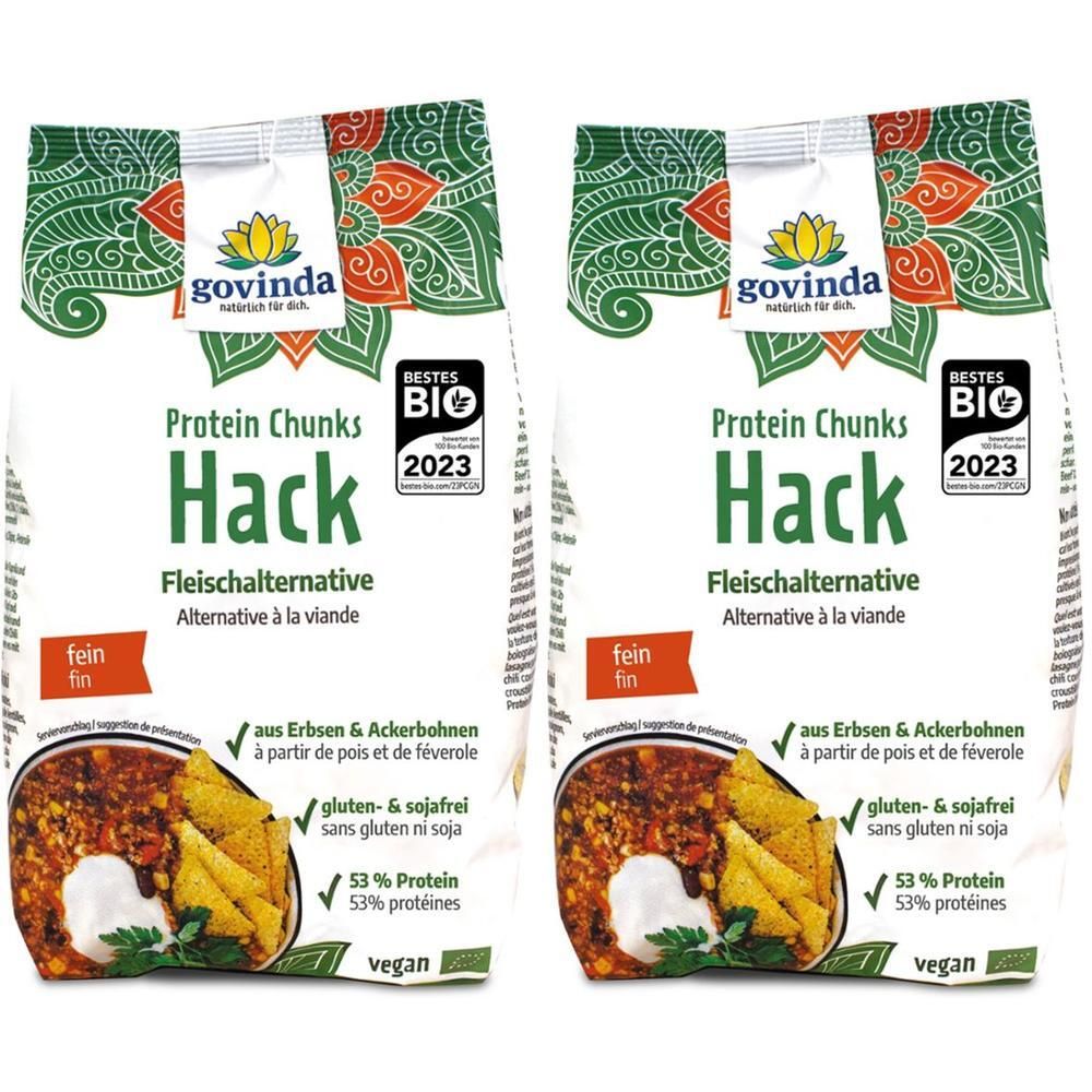 Zwei Packungen Govinda Protein Chunks Hack. Aufdruck: Fleischalternative, gluten- & sojafrei, 53% Protein, vegan. Bio-Siegel.