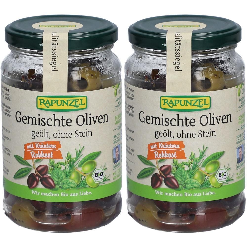 Zwei Gläser Rapunzel Oliven gemischt mit Kräutern, ohne Stein, geölt. Etikett mit Produktinformationen und Bio-Siegel.