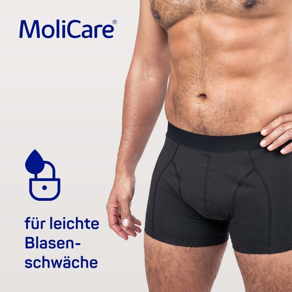 Mann in schwarzer MoliCare MEN Boxershorts. Text: für leichte Blasenschwäche. Logo: Tropfen in Schloss.