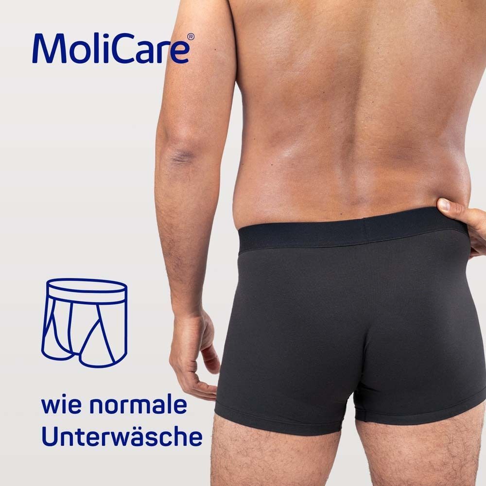 Mann in schwarzer MoliCare MEN Boxershorts. Text: wie normale Unterwäsche. Logo: Boxershorts-Umriss.
