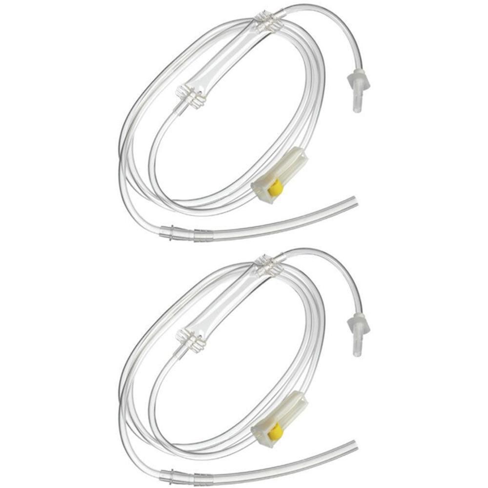 Zwei transparente Infusionssets mit gelben Elementen und Anschlüssen. Schläuche sind in Schlaufen gelegt.