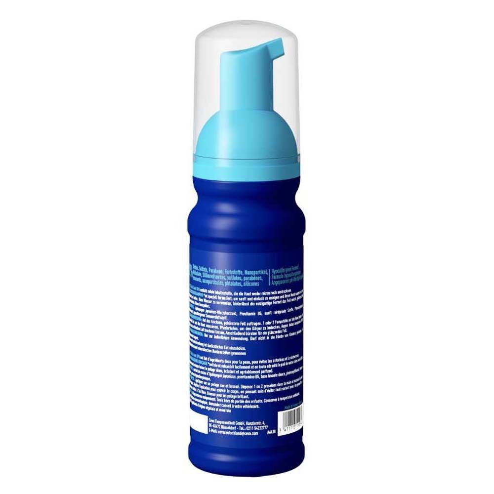 Rückseite einer blauen Flasche DOUXO® SPA Trockenshampoo. Text und Informationen zur Zusammensetzung und Anwendung.