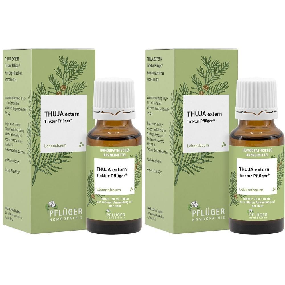 Zwei Flaschen und Verpackungen. Aufschrift: THUJA extern Tinktur Pflüger. Grün-weiße Verpackung, braune Glasflaschen.