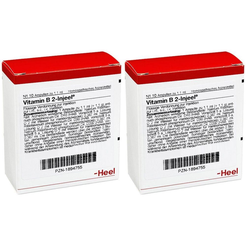 Zwei weiße Kartons mit rotem Deckel. Aufschrift: Vitamin B 2-Injeel. Darunter Text und Barcode. Marke: Heel.