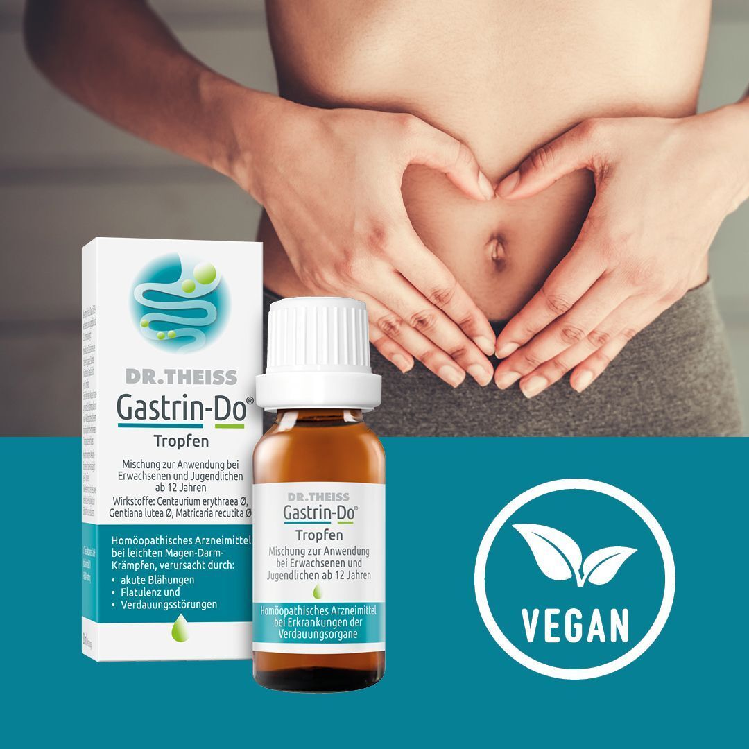 Flasche und Schachtel DR. THEISS Gastrin-Do Tropfen neben einer Person, die sich den Bauch hält. Vegan-Siegel.
