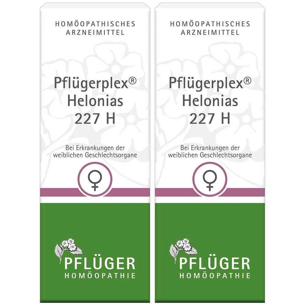Zwei Packungen Pflügerplex Helonias 227 H. Weiß, lila und grünes Design. Text: Homöopathisches Arzneimittel, Pflüger, weibliches Symbol.