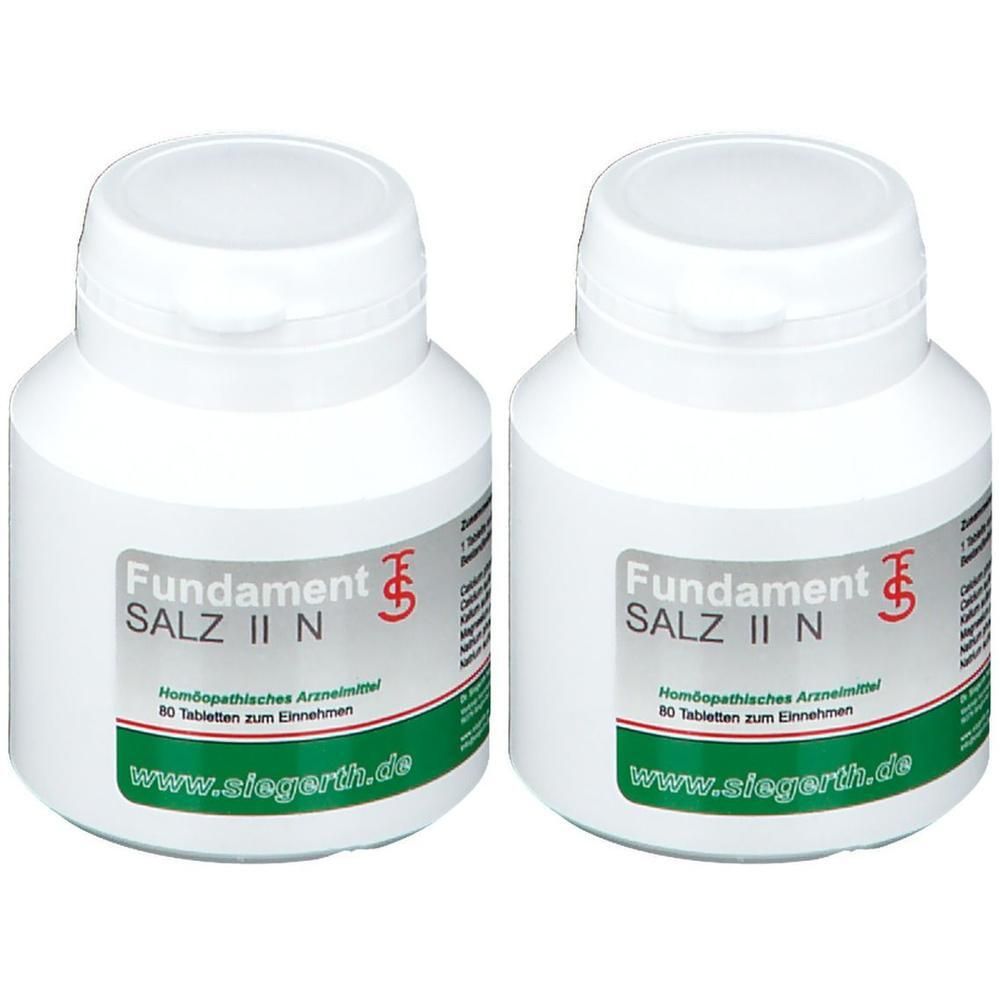 Zwei weiße Tablettenflaschen mit Deckel. Aufschrift: FUNDAMENT SALZ II N. Homöopathisches Arzneimittel. Website-Adresse.