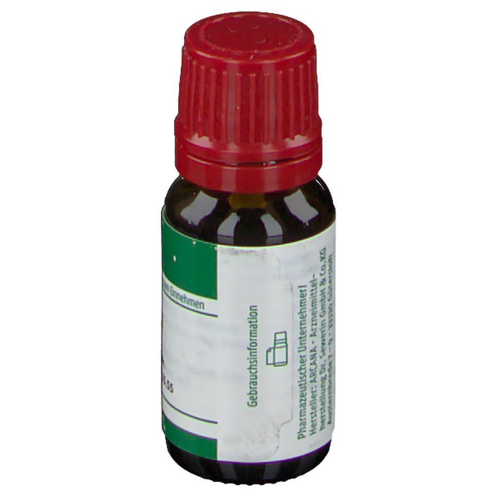 Rückseite einer braunen Glasflasche mit rotem Schraubverschluss, ARCANA Stramonium LM XVIII.
