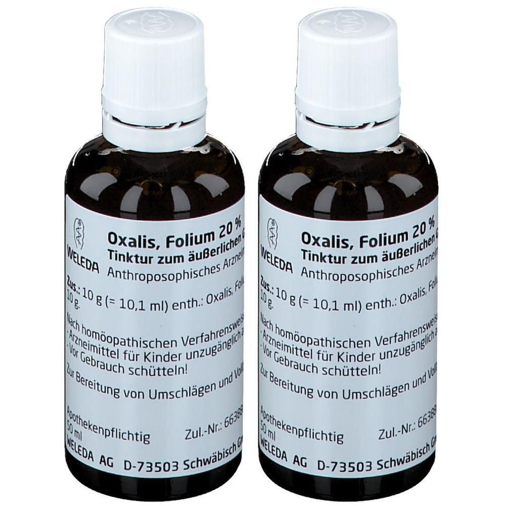 Zwei Flaschen Oxalis Folium 20% Tinktur von Weleda. Dunkelbraune Glasflaschen mit weißen Verschlüssen und Etiketten.