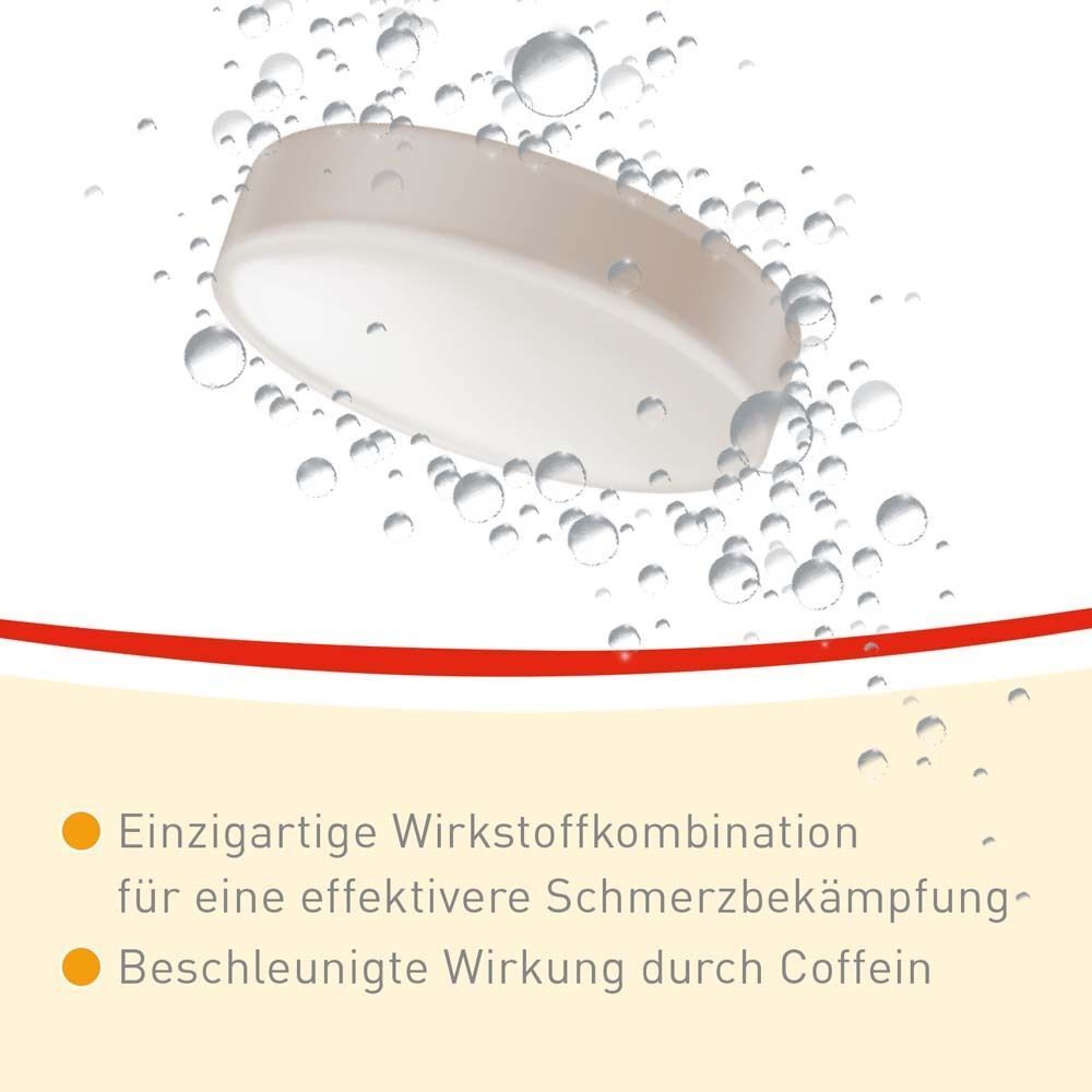 Nahaufnahme einer Togal Brausetablette mit aufsteigenden Bläschen.