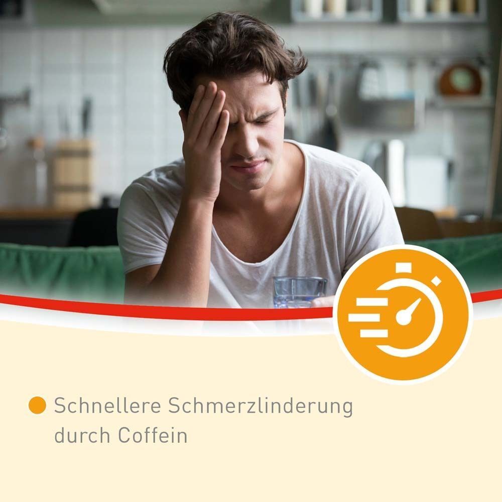 Mann mit Kopfschmerzen hält sich die Stirn. Symbol für schnelle Schmerzlinderung.