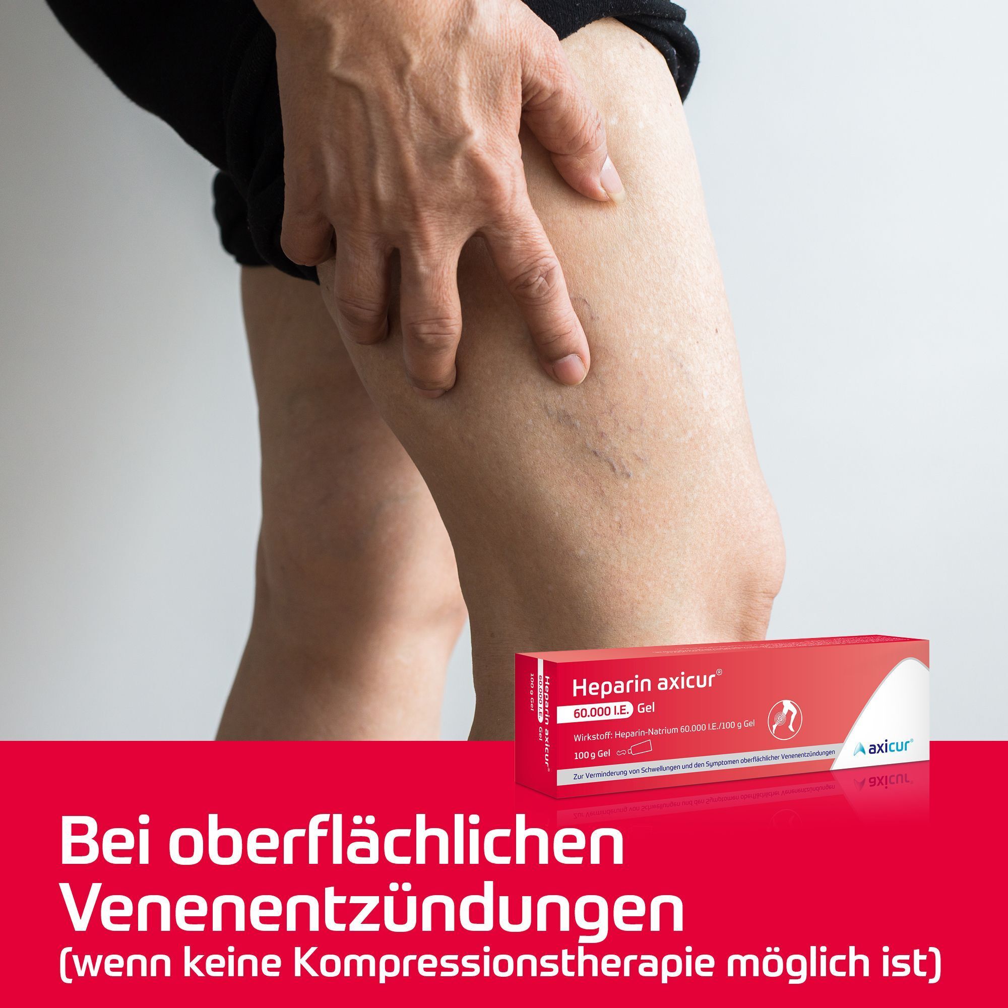 Bein mit Krampfadern, daneben eine Packung Heparin axicur® Gel.