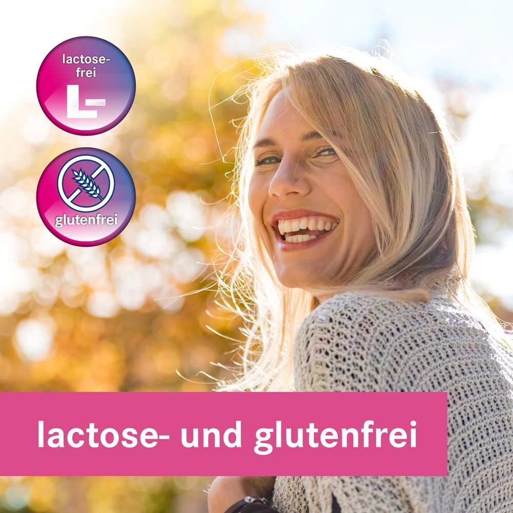Lachende Frau im Freien mit Symbolen für lactose- und glutenfrei. Text: lactose- und glutenfrei.