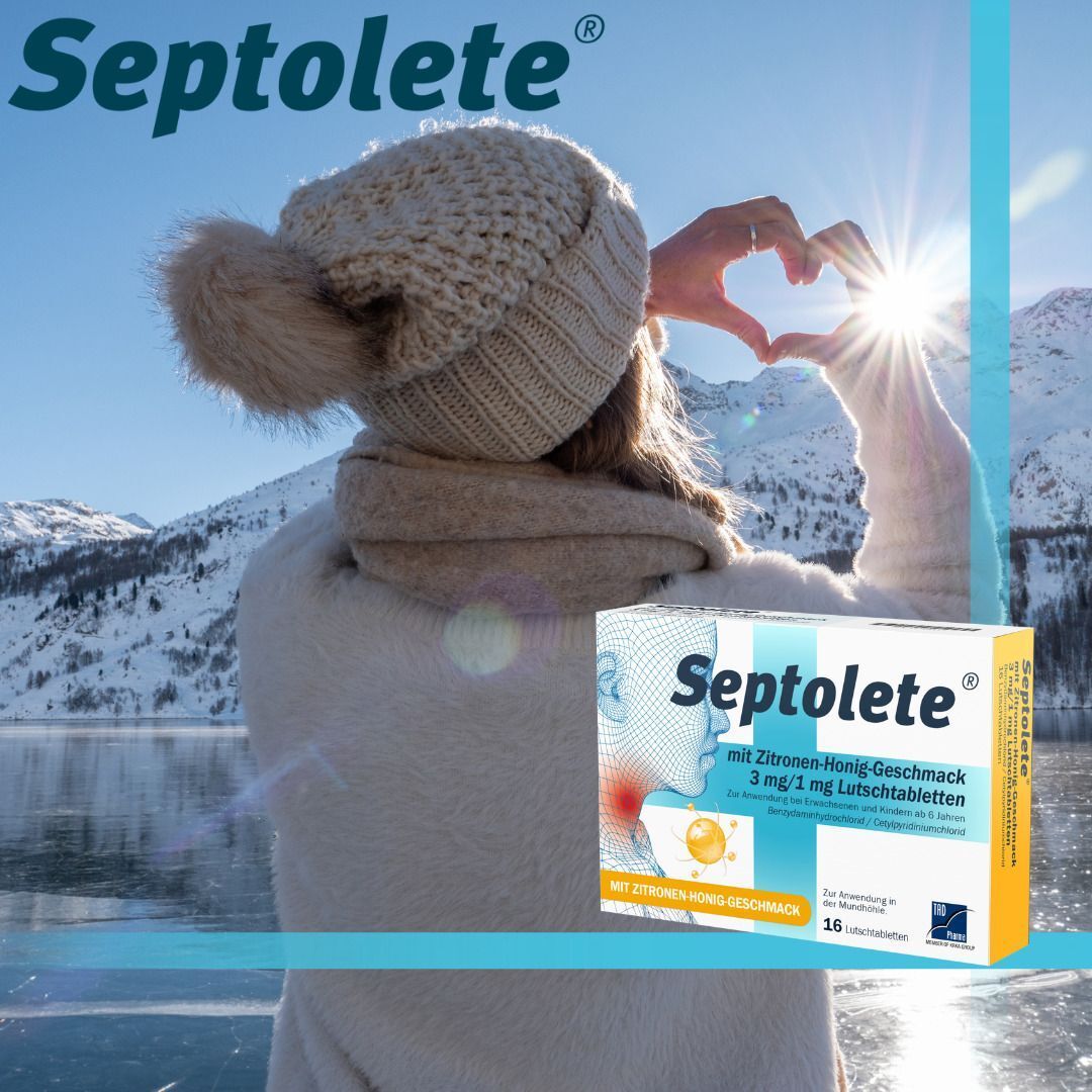 Frau mit Herz aus Schnee und einer Packung Septolete Lutschtabletten mit Zitrone-Honig-Geschmack.
