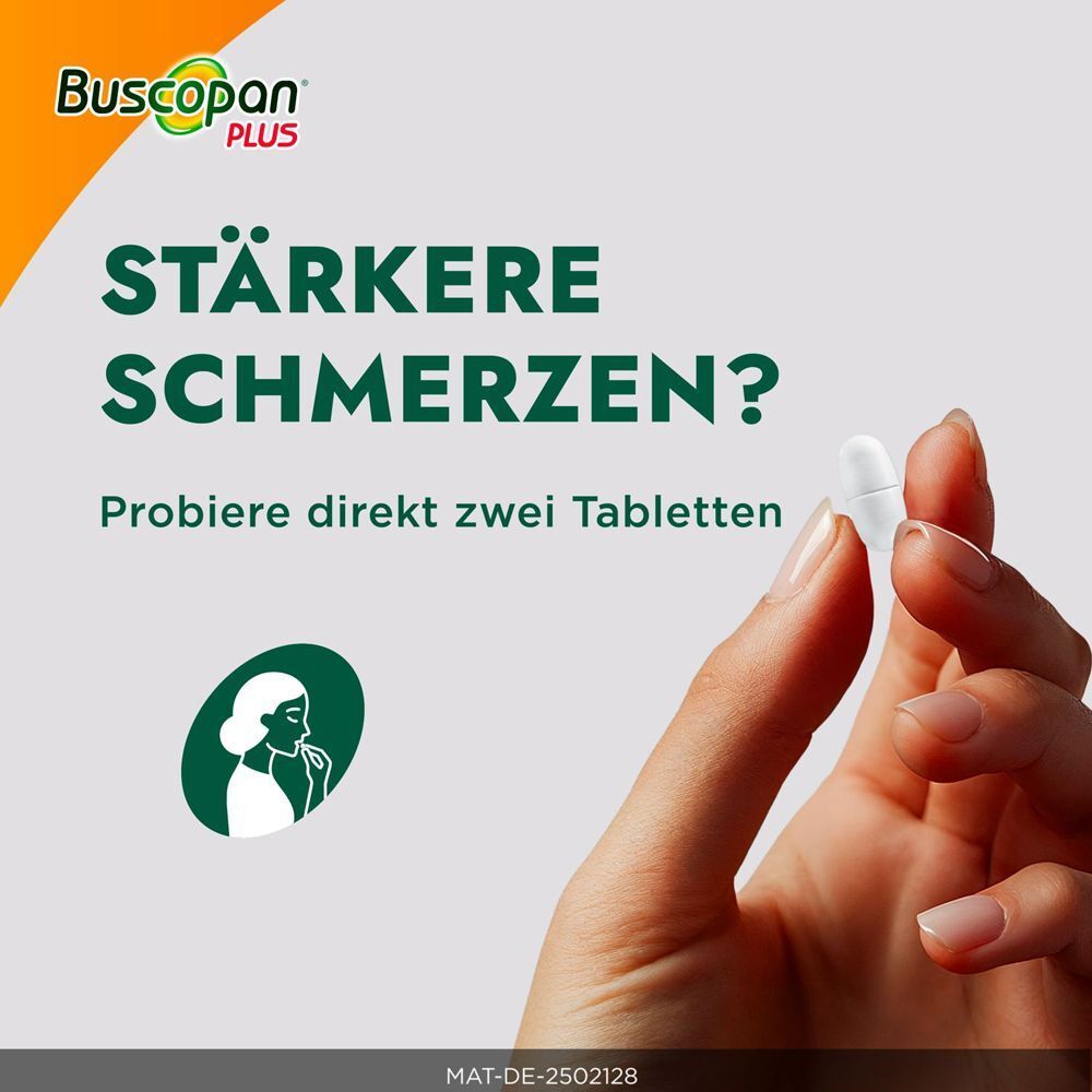 Hand hält eine Tablette Buscopan Plus, für stärkere Schmerzen.