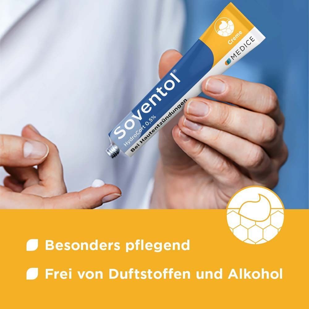 Eine Hand tropft Soventol Hydrocort 0,5% Creme auf die andere Hand.