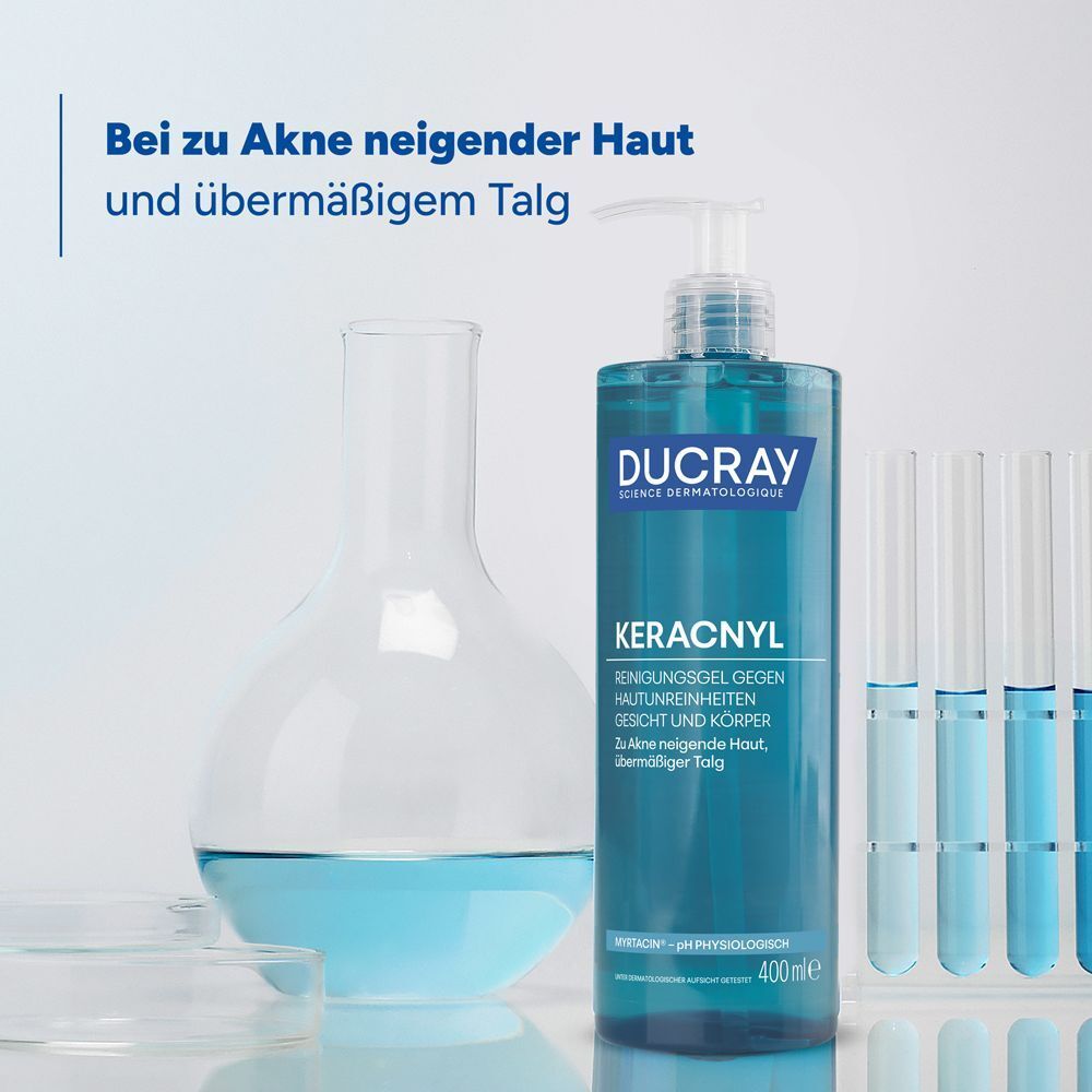 Ducray Keracnyl Waschgel neben Laborgeräten, für zu Akne neigende Haut.