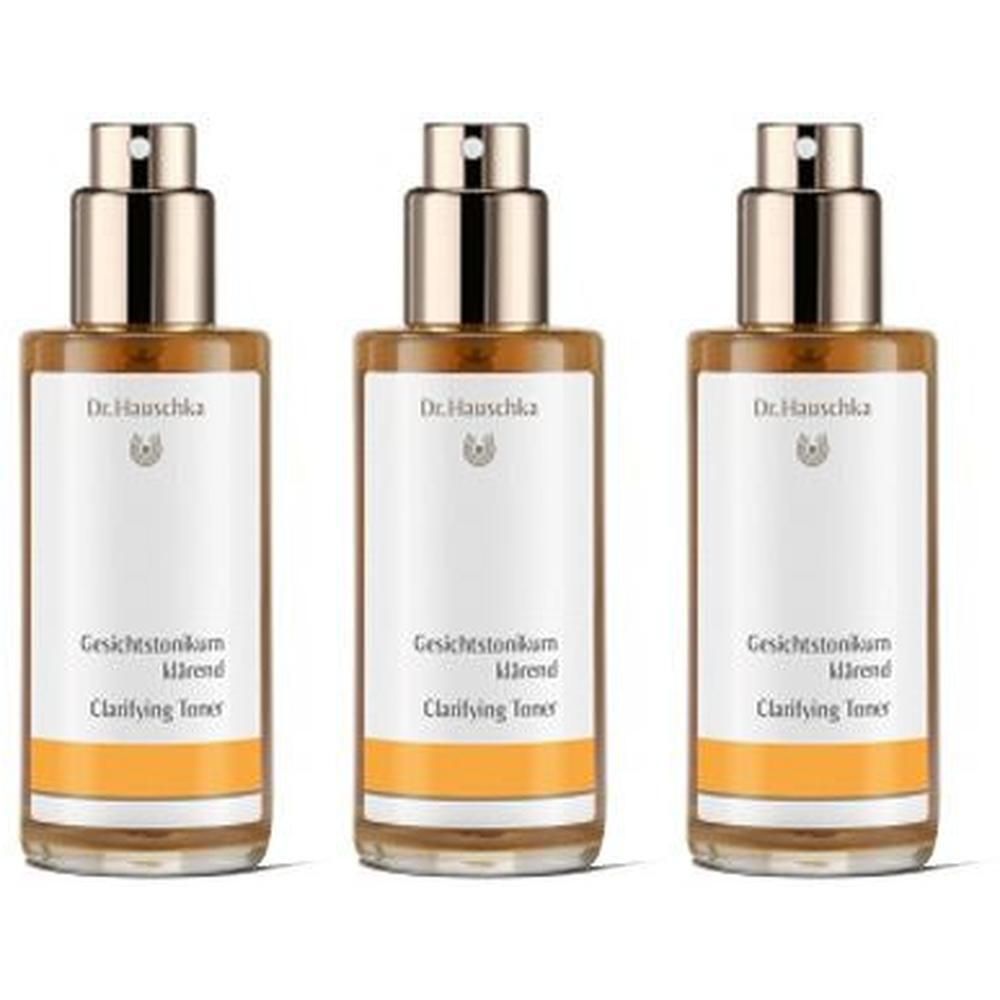 Drei Dr. Hauschka Gesichtstonikum klärend Flaschen mit Pumpsprühkopf und weißem Etikett.