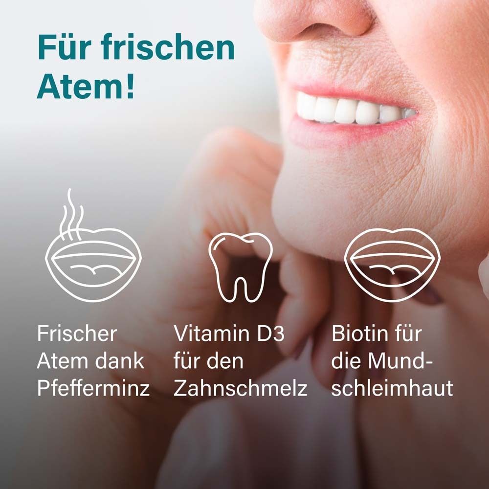 Nahaufnahme eines lächelnden Mundes mit Icons für frischen Atem, Vitamin D3 und Biotin.