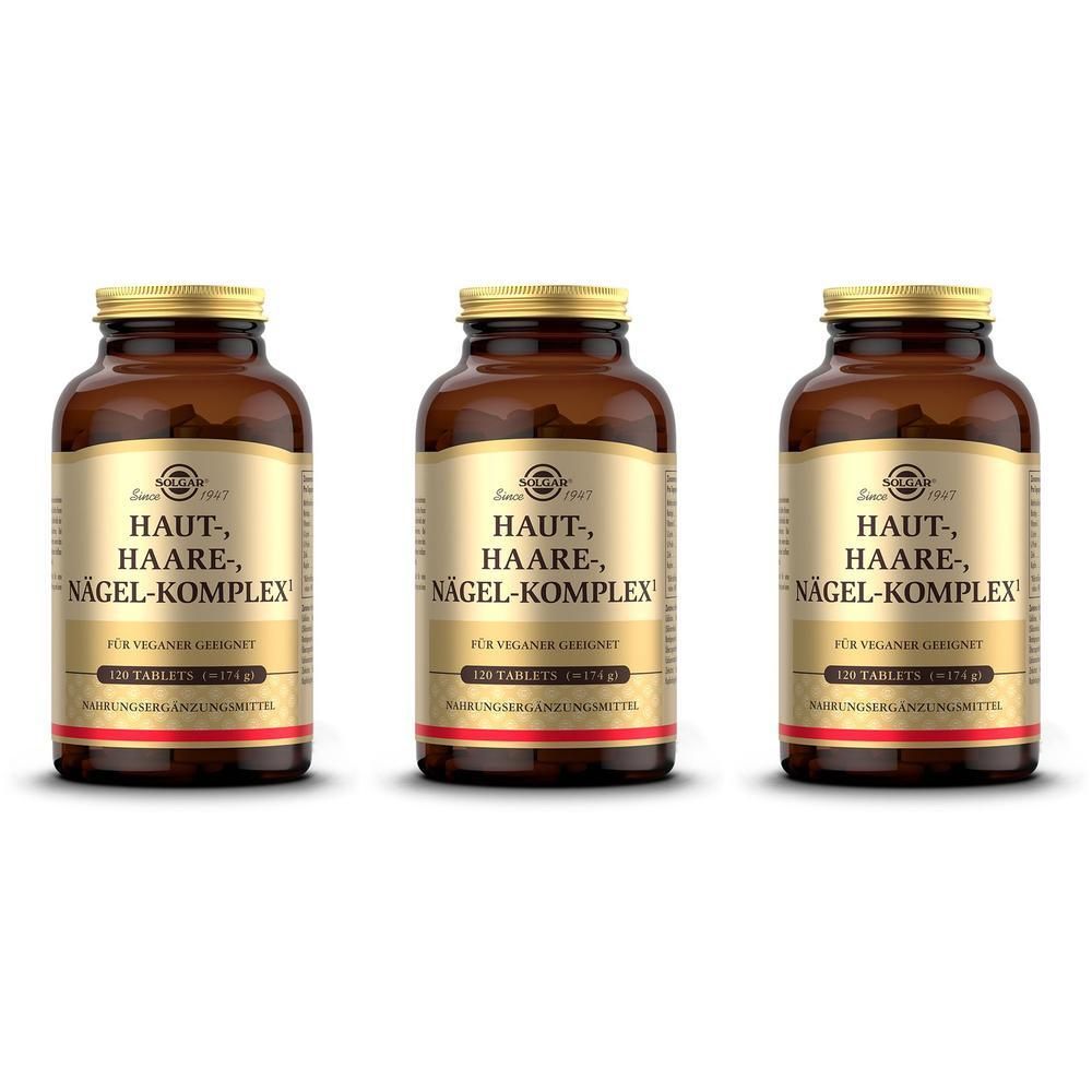 Drei braune Glasflaschen mit goldfarbenem Etikett für Haut-, Haare-, Nägelkomplex.