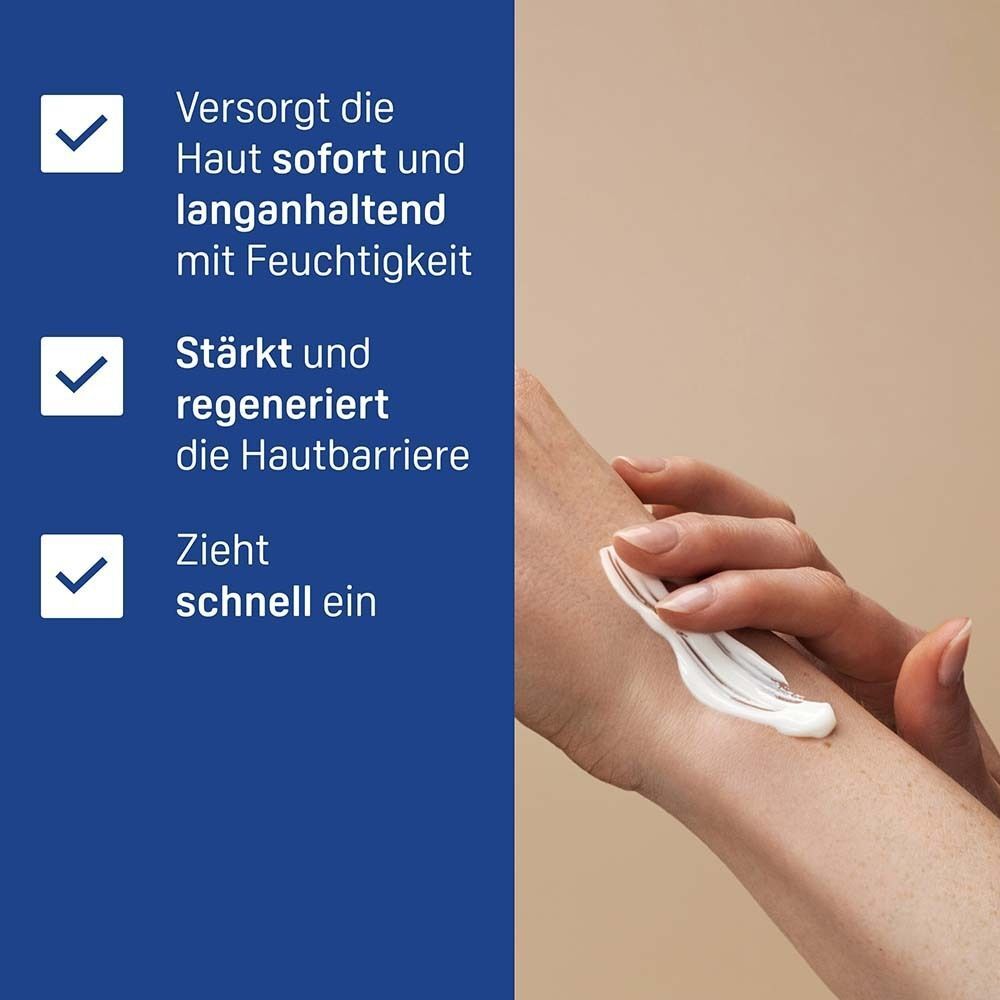 Hand trägt Creme auf Arm auf, mit Text über Feuchtigkeit, Hautbarriere und schnelles Einziehen.