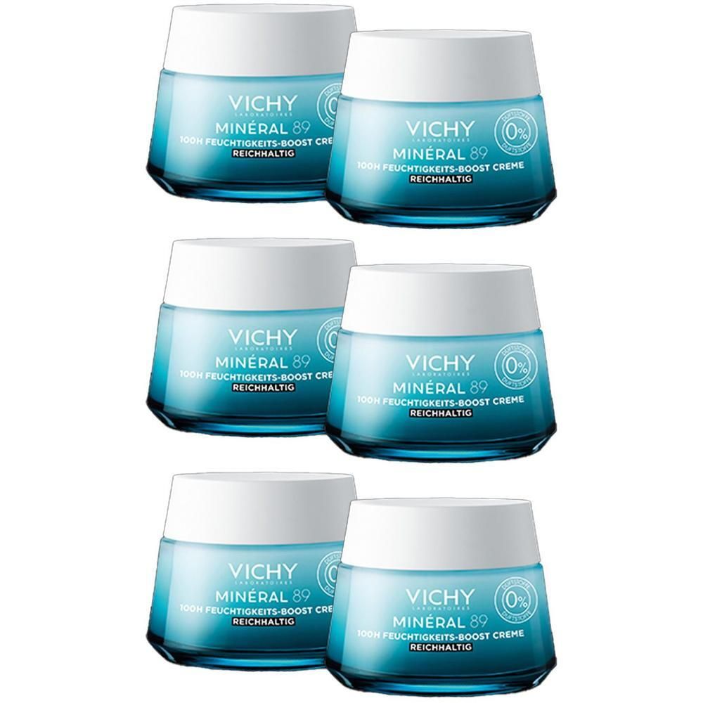 Sechs Vichy Mineral 89 Feuchtigkeits-Boost Creme Tiegel. Hellblaue Tiegel mit weißen Deckeln.
