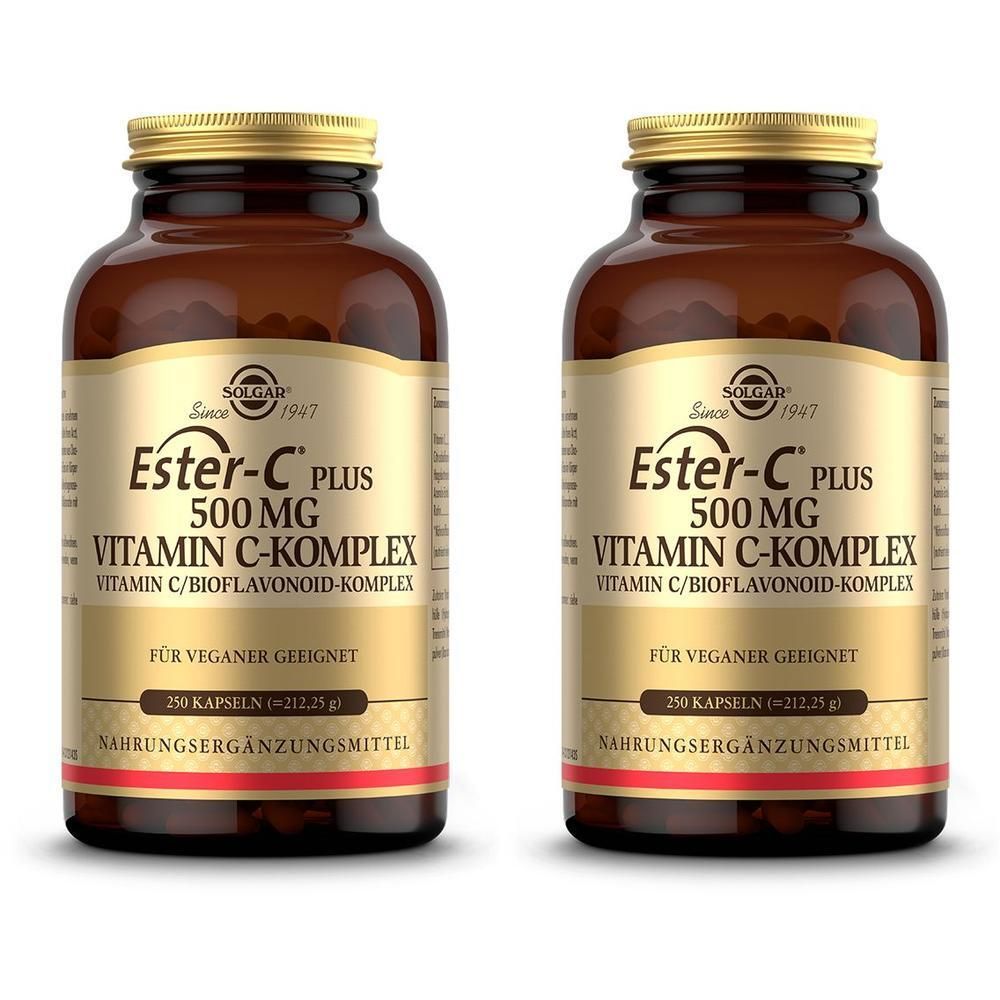 Zwei braune Glasflaschen mit Solgar Ester-C Plus 500 mg Kapseln, Etiketten mit Produktinformationen.