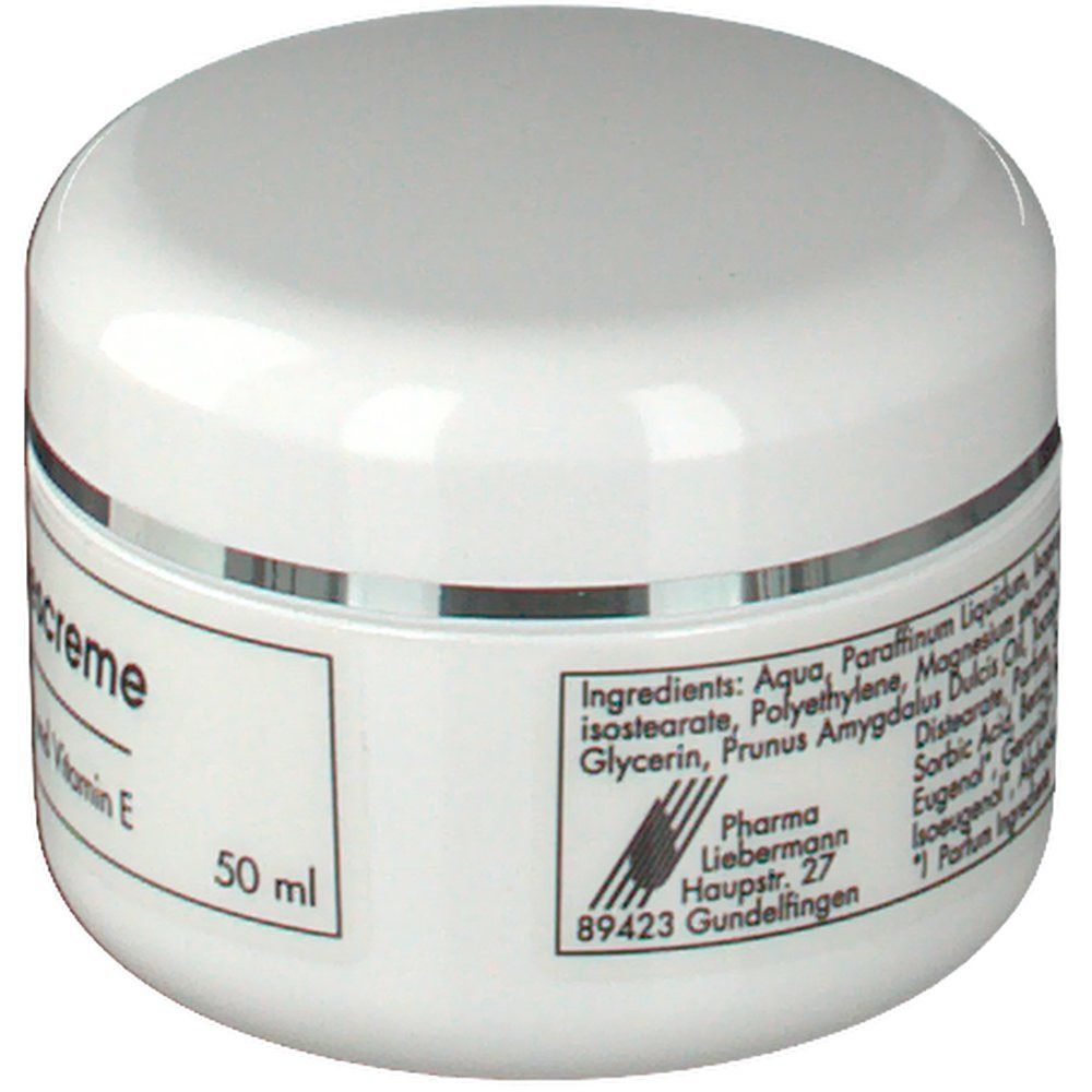 Ein weißer Tiegel Vitamin E Tagescreme, 50 ml. Enthält Inhaltsstoffe wie Aqua, Paraffinum Liquidum und Vitamin E.