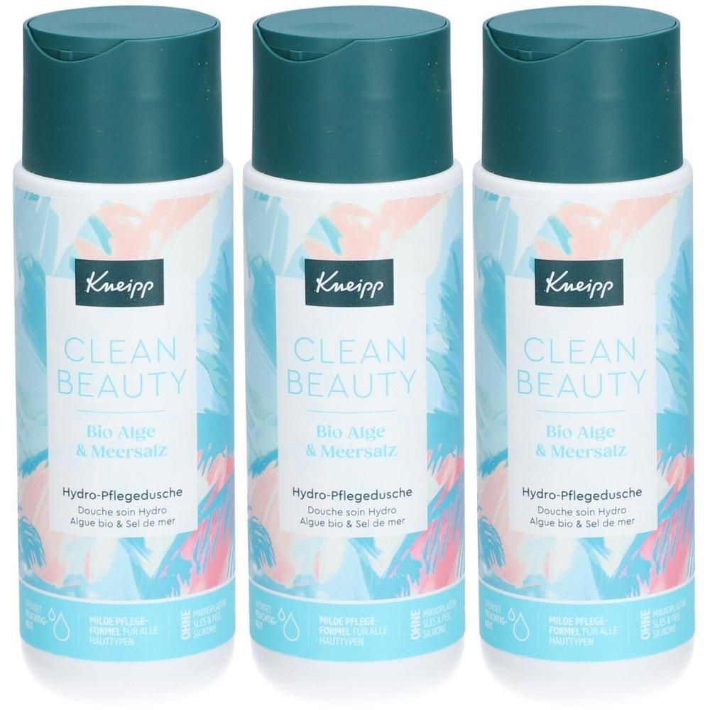 Drei Flaschen Kneipp Clean Beauty Hydro Pflegedusche Bio Alge & Meersalz mit türkisfarbenen Verschlüssen und floralem Design.