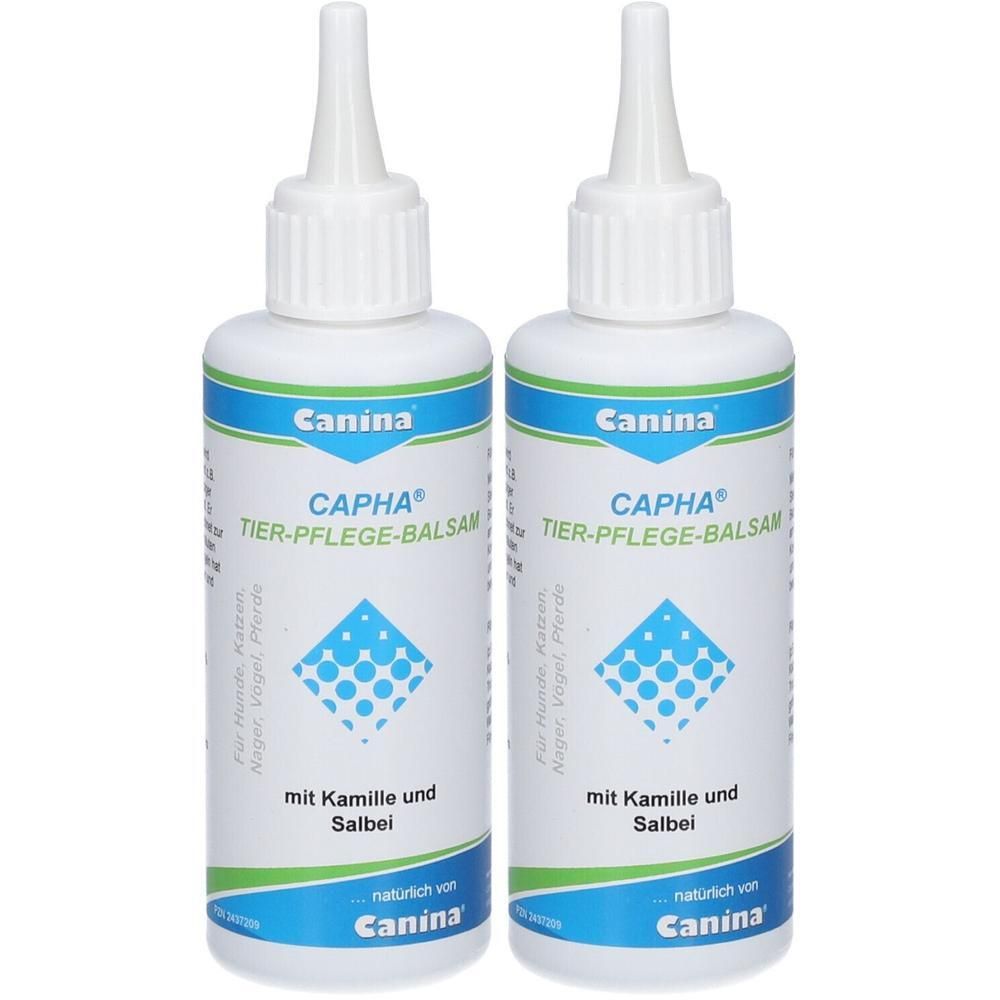 Zwei weiße Flaschen Canina CAPHA Tier-Pflege-Balsam mit Kamille und Salbei. Klare Applikatorspitzen.