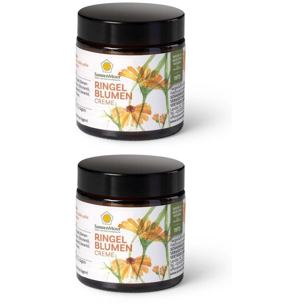 Zwei Gläser SonnenMoor Ringel Blumen Creme mit schwarzem Deckel und Etikett mit Ringelblumenmotiv.