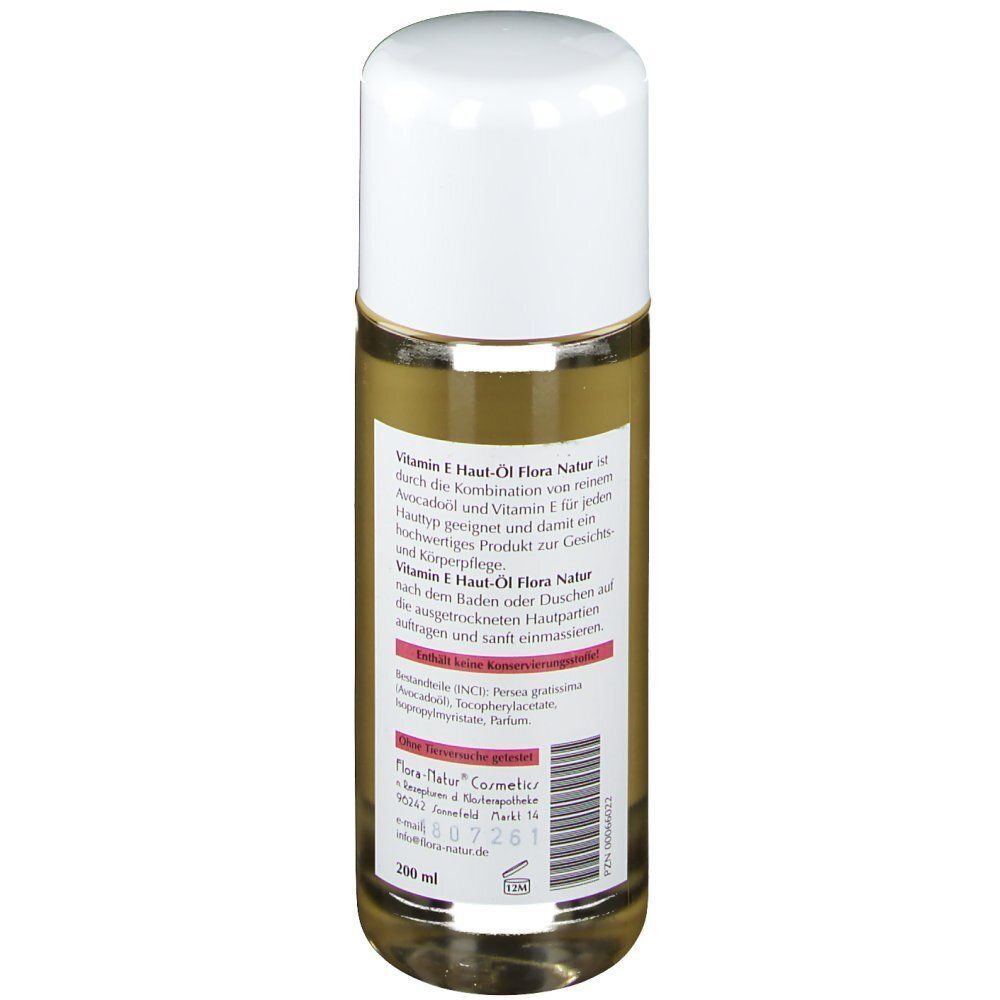 Rückseite einer Flasche Flora-Natur Vitamin E Hautöl mit detaillierten Anwendungshinweisen.
