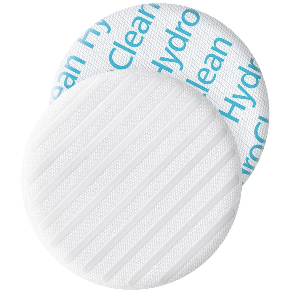 Zwei HydroClean® 4 cm Pads, eines mit Streifenmuster, das andere mit Logo.
