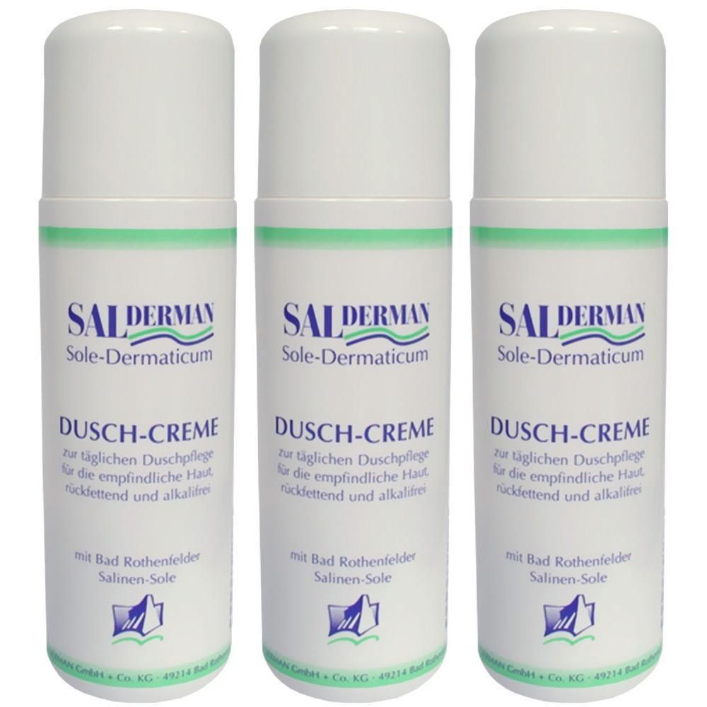 Drei weiße Flaschen SALDERMAN Sole-Dermaticum Dusch-Creme mit grünen Akzenten und Produktinformationen.