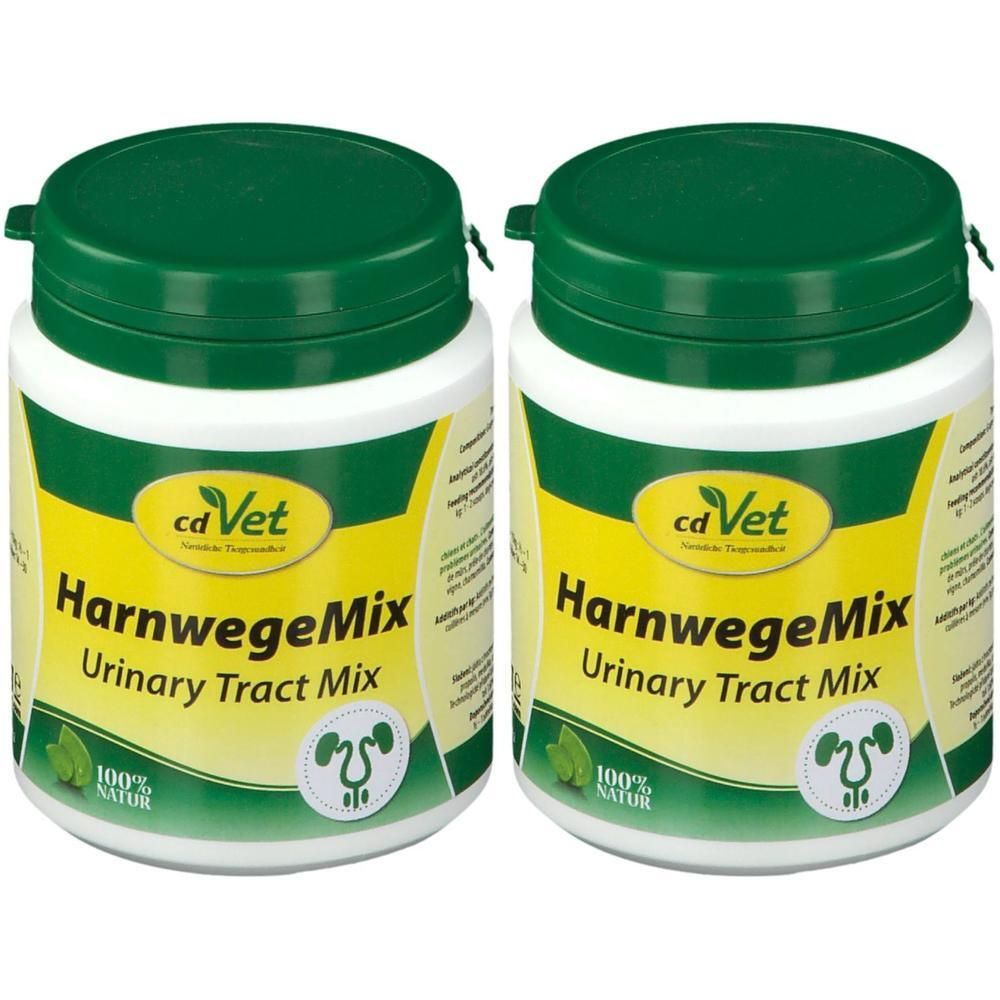Zwei Behälter cd Vet HarnwegeMix mit grünen Schraubverschlüssen. Gelbes Etikett mit Produktnamen und Symbol.